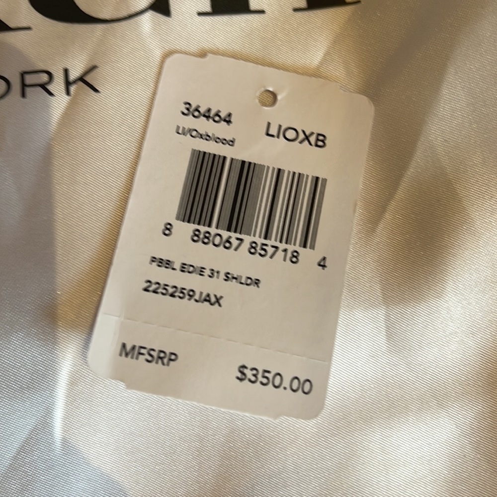 Coach Edie 31 Refined Pebble
Leather Shoulder Bag NWT in Oxblood w duster - Picture 9 of 9